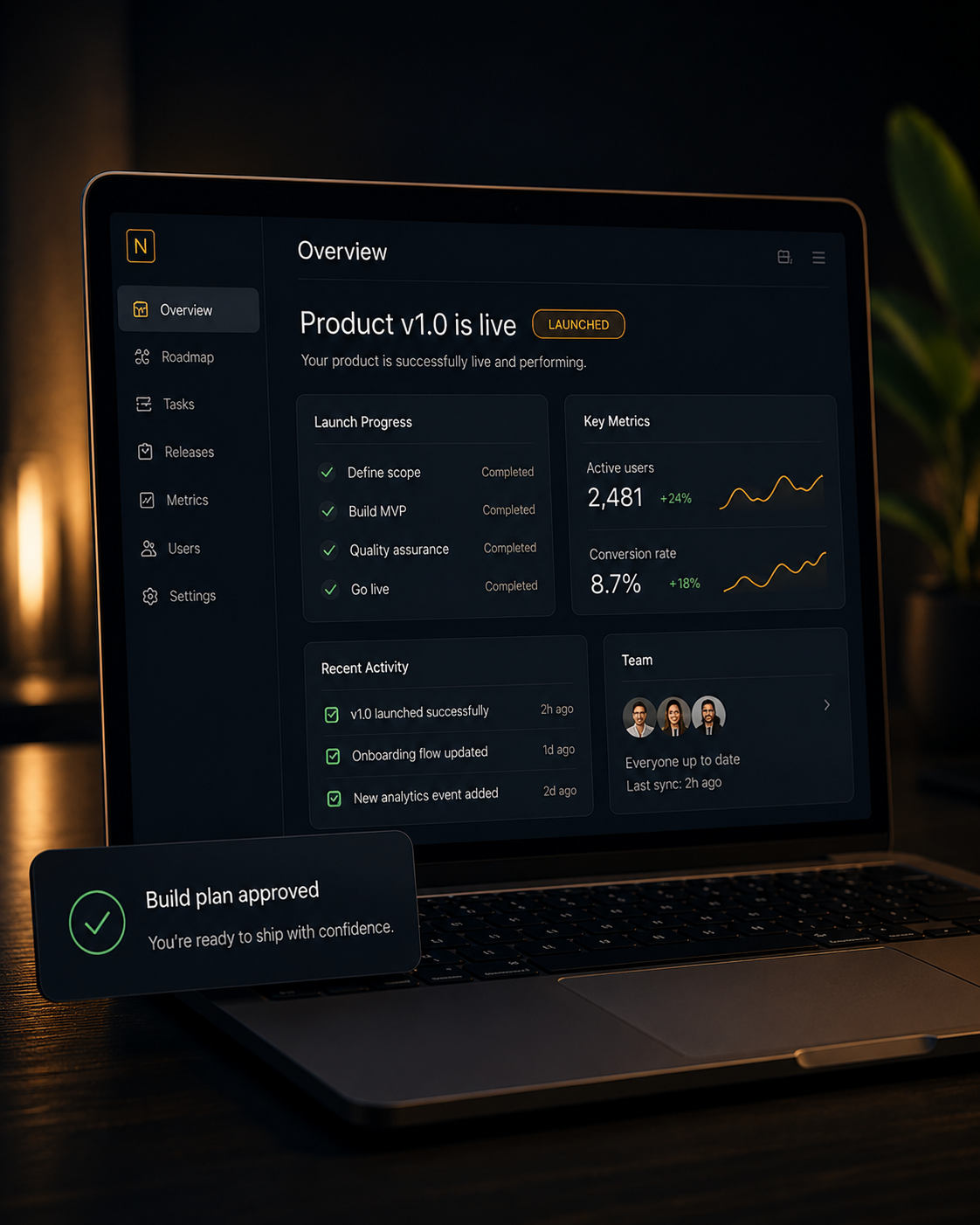MacBook showing a deployed product dashboard with live metrics and build-plan approval